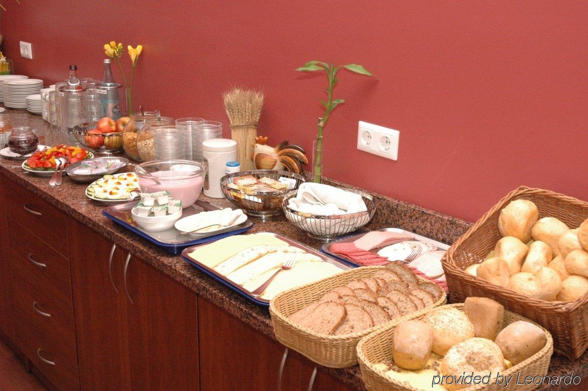 Rewari Hotel Berlín Restaurante foto